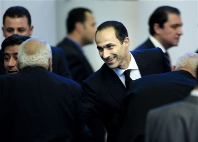 Gamal Mubarak, the son of Egyptian President Hosni Mubarak, greets attendees of the sessions of the 7th Annual Conference of the National Democratic Party in Cairo, Egypt, on Saturday. 